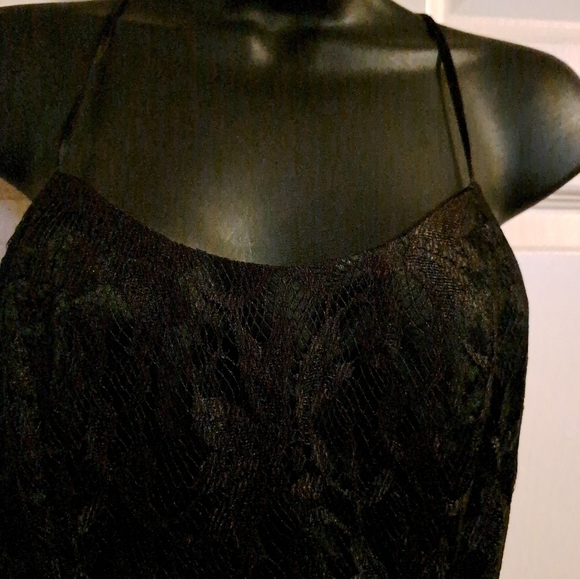 All that jazzy two Piece Dress and jacket outer material is lace. - Picture 2 of 10